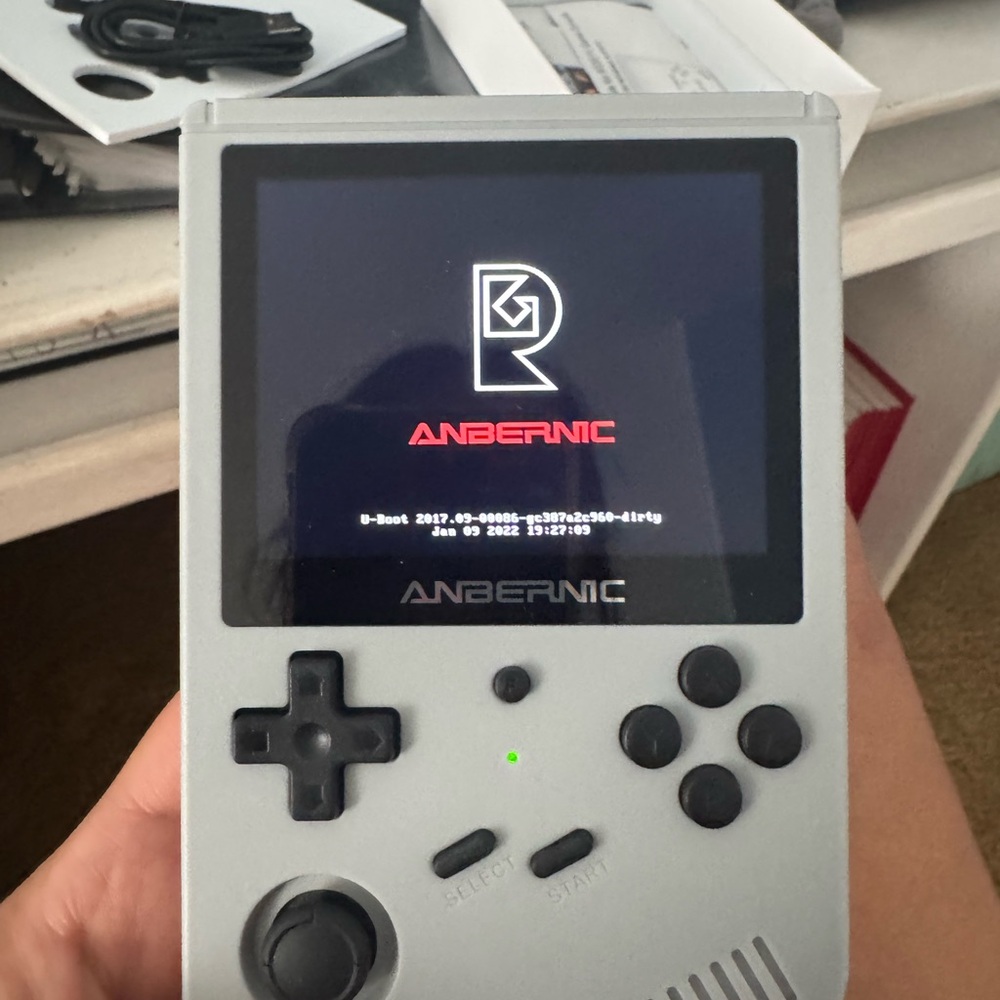 Anbernic Gray and Black Handheld Gaming Console with LCD Display ton of games!